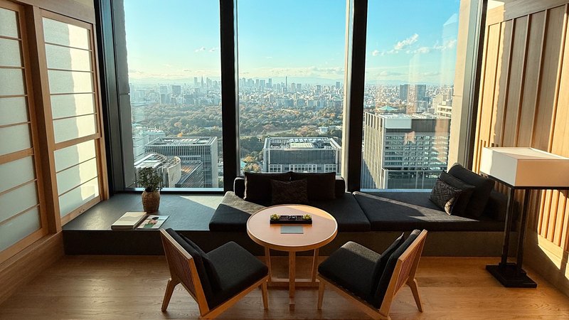Interior overlooking Tokyo — editorial illustration, not a GAISAPP listing
